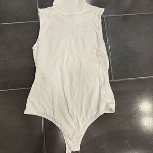 White Sleeveless Turtleneck One Piece